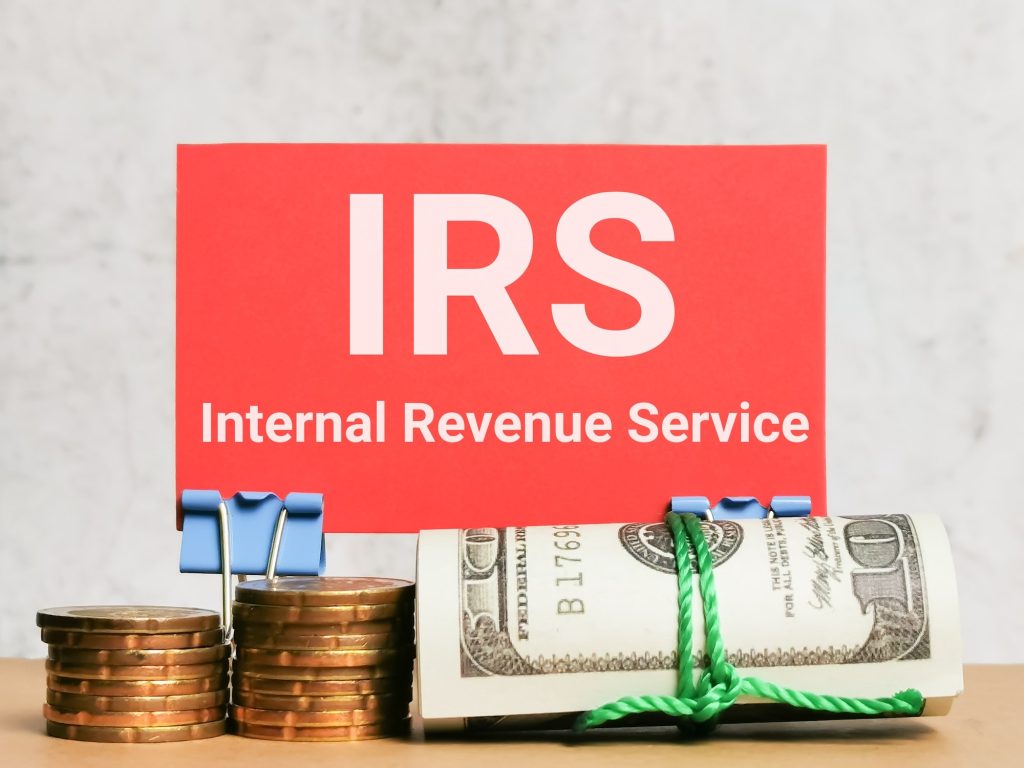 Phrase IRS INTERNAL REVENUE SERVICE written on red card